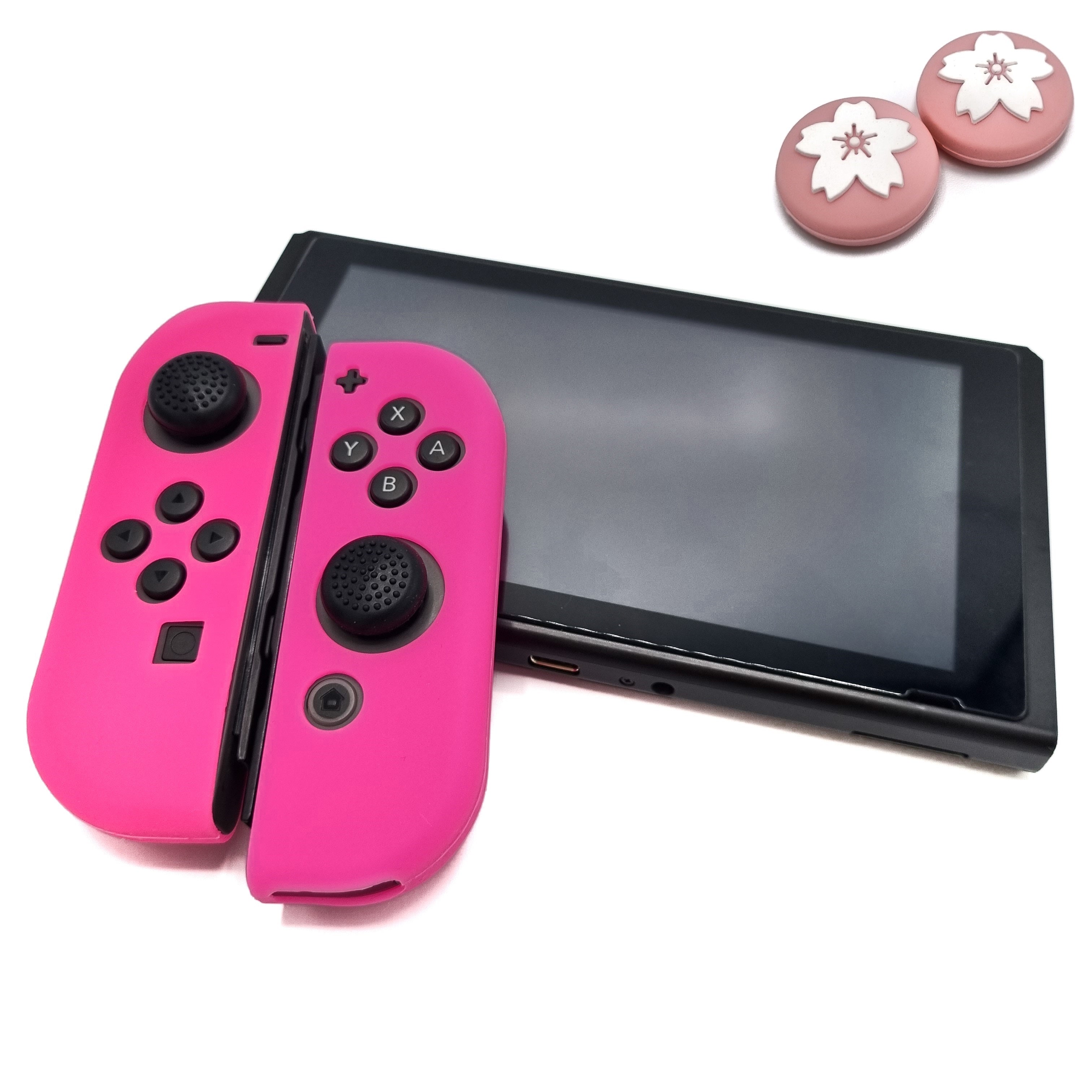 Schutzhüllen + Daumengriffe | Performance Anti-Rutsch-Haut | Softcover-Griffhülle | Rosa + Blumen | Zubehör passend für Nintendo Switch Joy-Con Controller