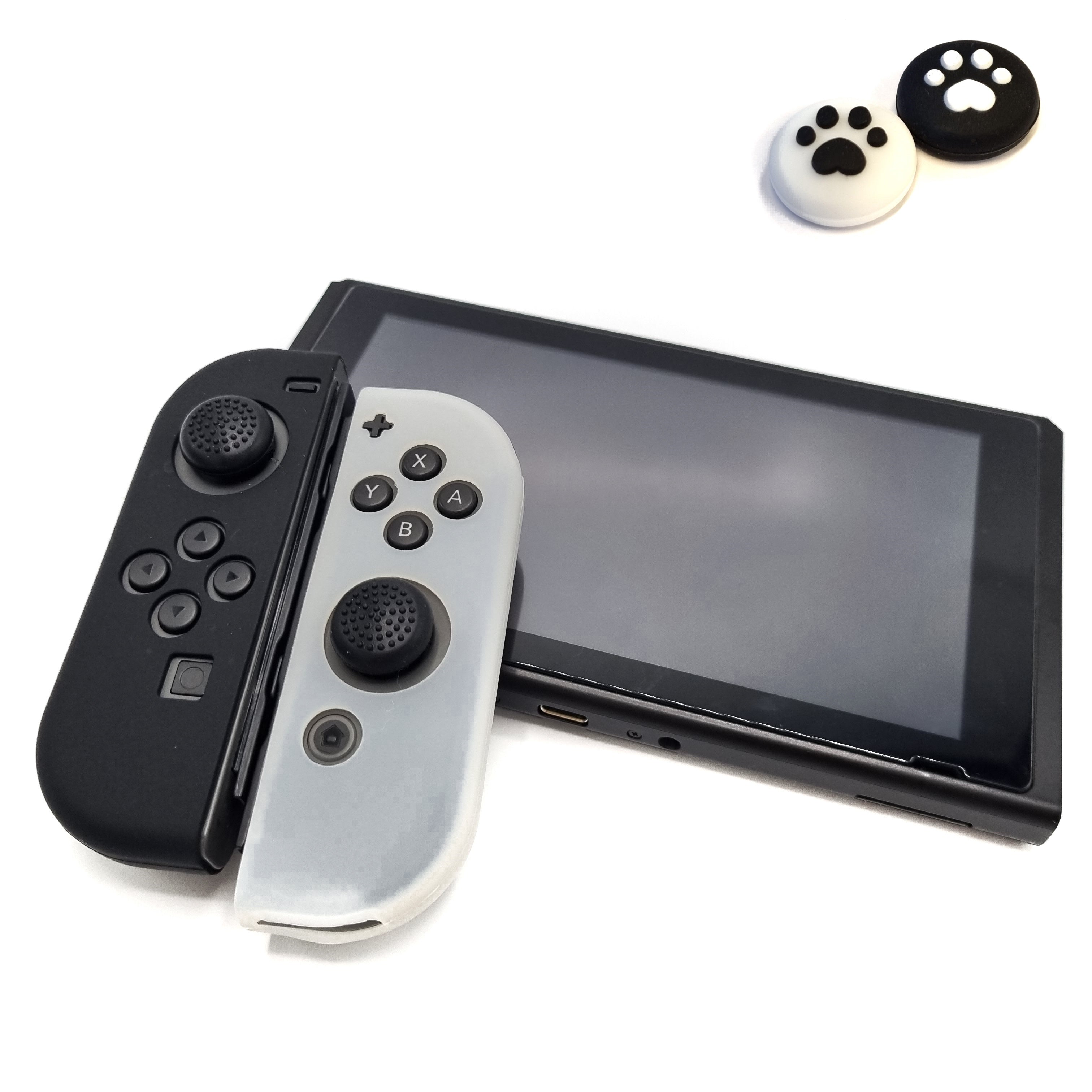 Schutzhüllen + Daumengriffe | Performance Anti-Rutsch-Haut | Softcover-Griffhülle | Transparent/Schwarz + Beine Schwarz/Weiß | Zubehör passend für Nintendo Switch Joy-Con Controller